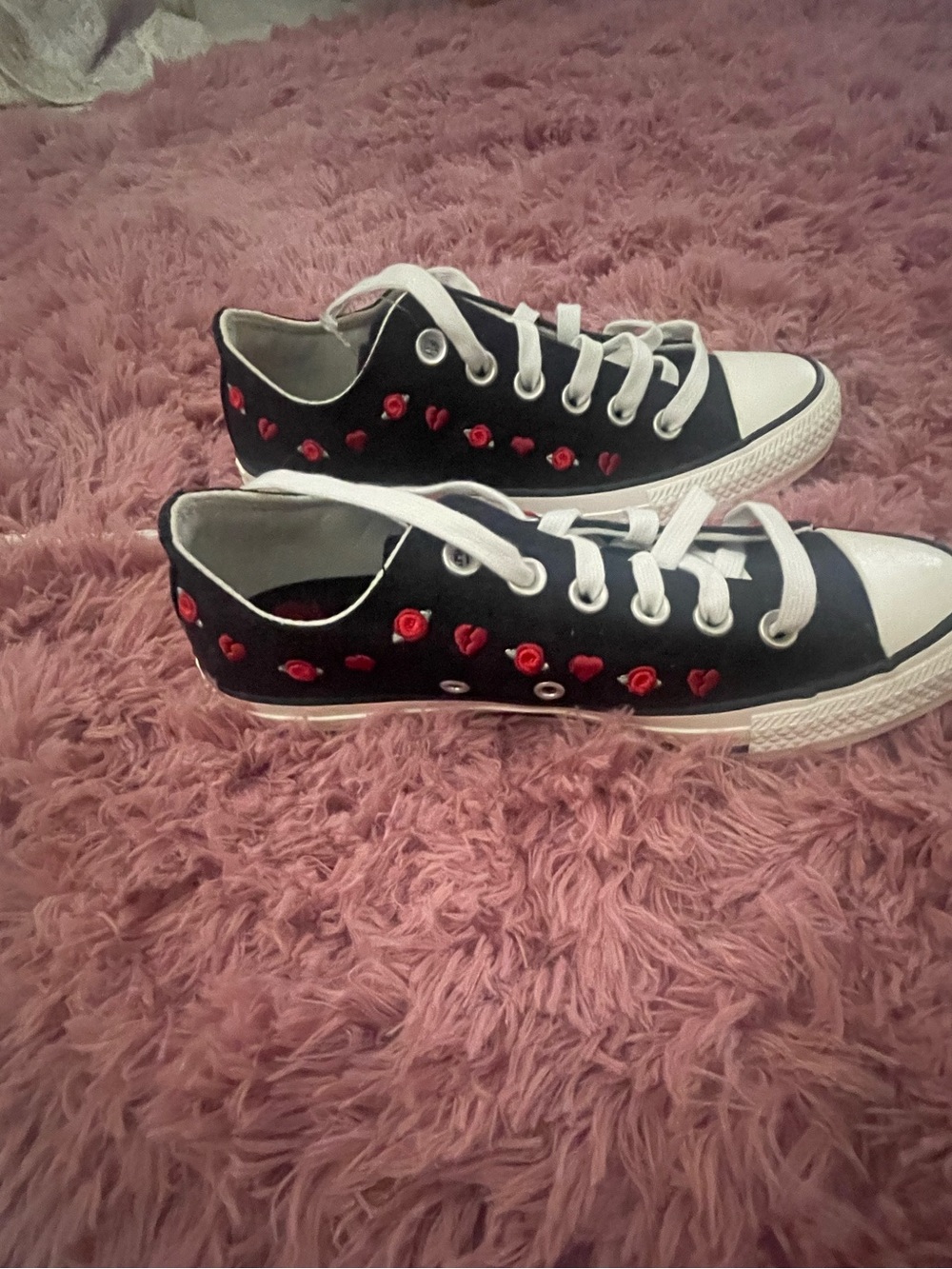 Converse Black Low-Top Sneakers with White Trim and Red Rose Accents
